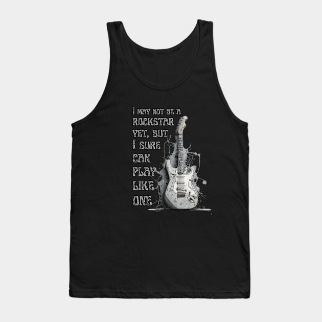 I may not be a rockstar yet, but I sure can play like one. Guitar. Tank Top by ThatSimply!